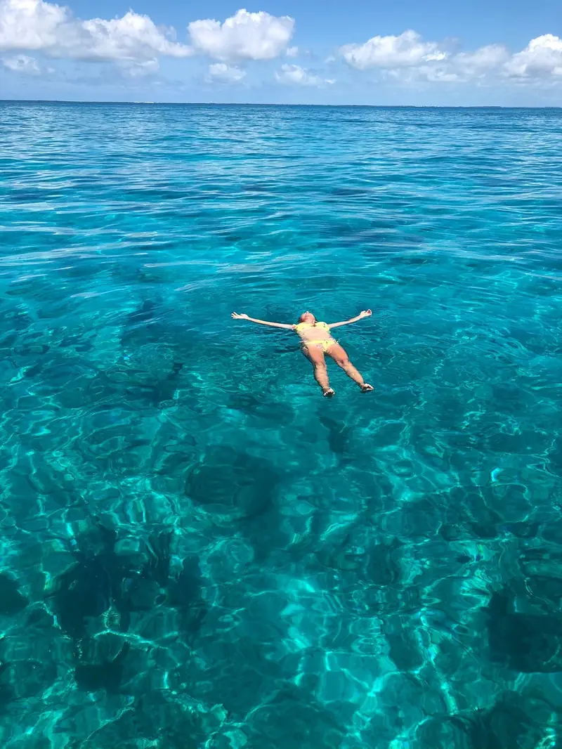 Floating in crystal clear water