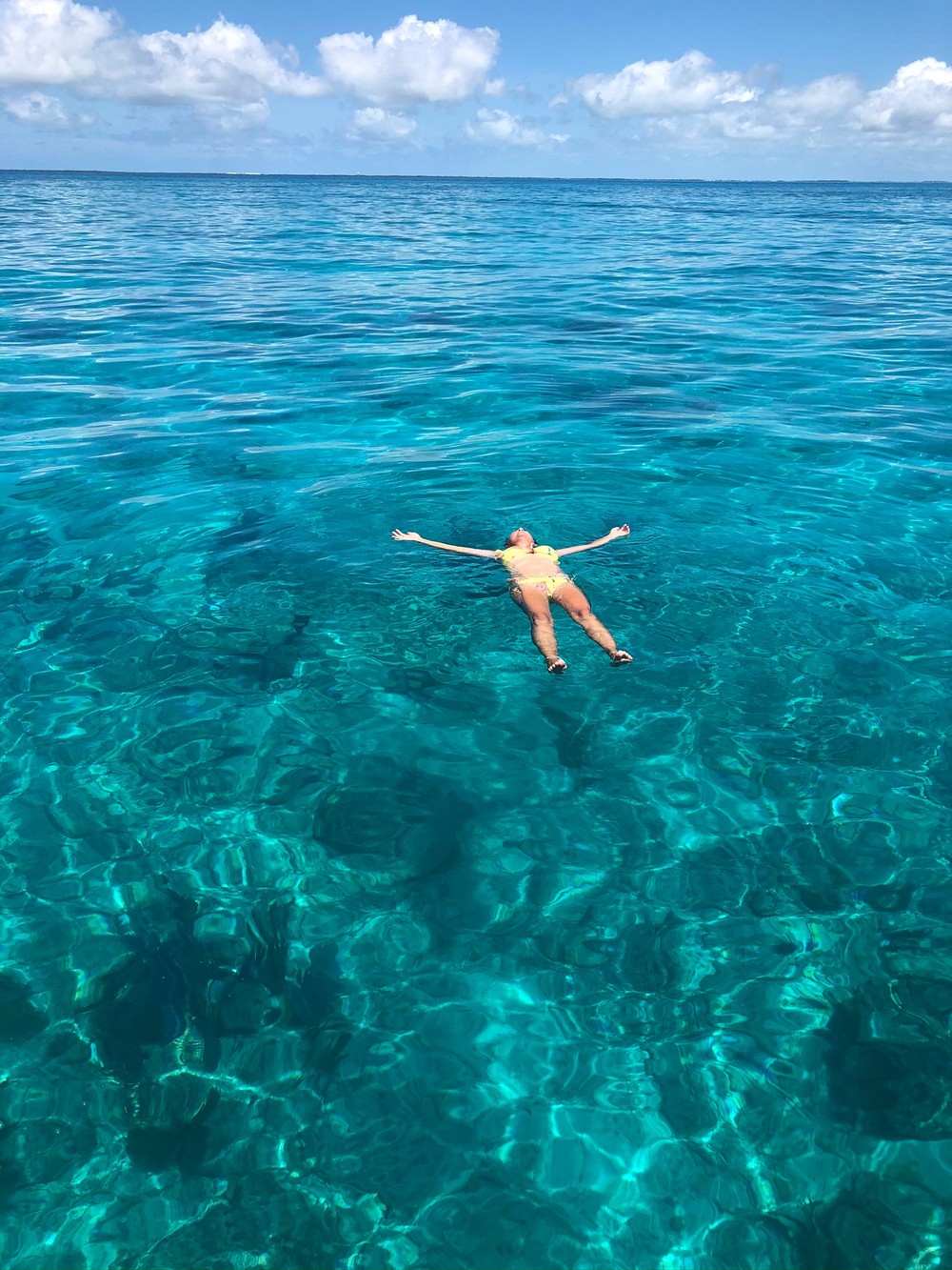 Floating in crystal clear water